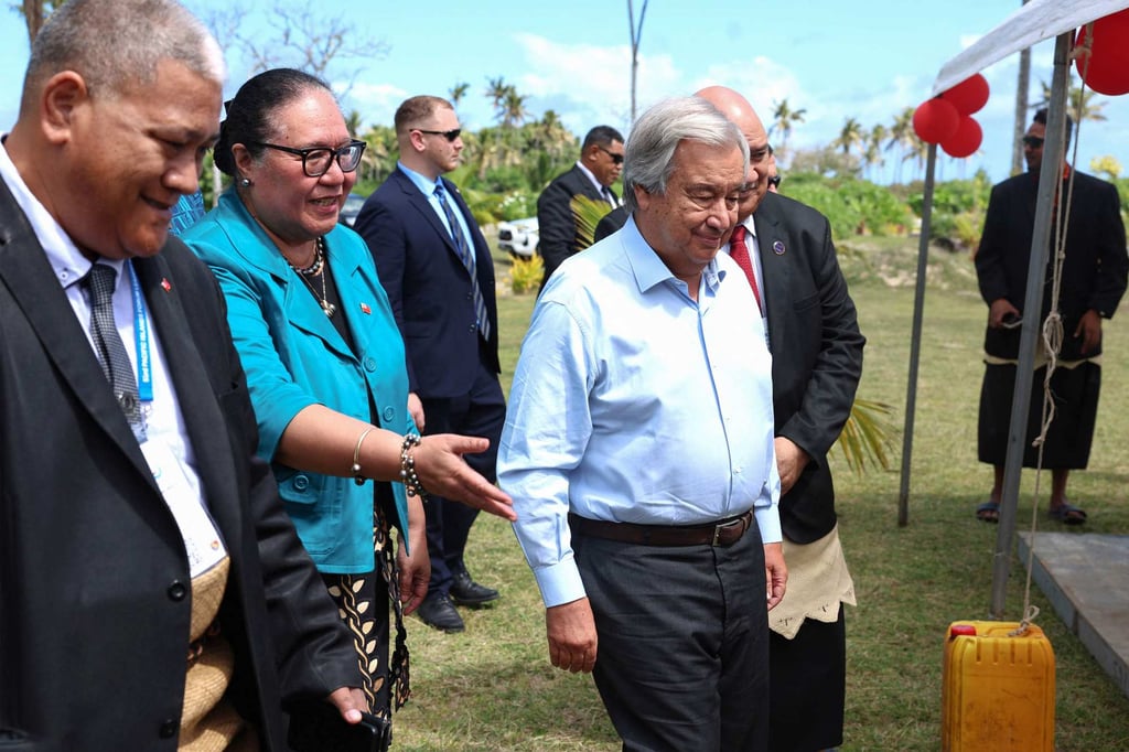 United Nations Secretary General Antonio Guterres (second from right) visits the Ha’atafu Beach, an area affected by the volcanic eruption and tsunami in 2022, in Tongatapu on Tuesday. Photo: AFP