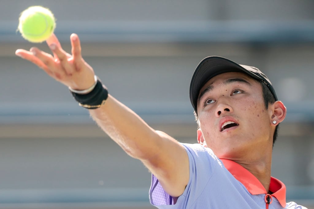 Jerry Shang Juncheng gets ready to serve to Roberto Carballes during their men’s singles second round match at the US Open. Photo: EPA-EFE