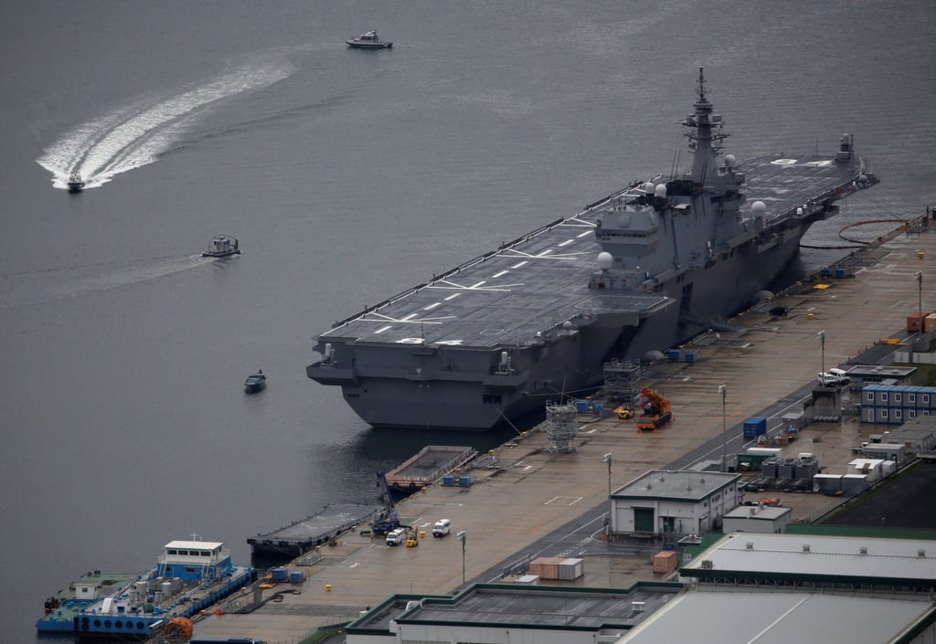 Japan Maritime Self-Defence Force’s Izumo-class helicopter carrier DDH-184 Kaga is moored at a naval base in Sasebo, on the southwest island of Kyushu in April 2018. Photo: Reuters
