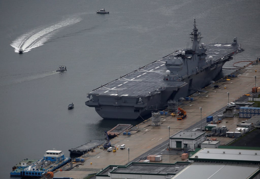 Japan Maritime Self-Defence Force’s Izumo-class helicopter carrier DDH-184 Kaga is moored at a naval base in Sasebo, on the southwest island of Kyushu in April 2018. Photo: Reuters